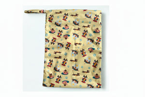 Wet bag for swimming with a colourful pattern of cartoon dogs on a yellow background
