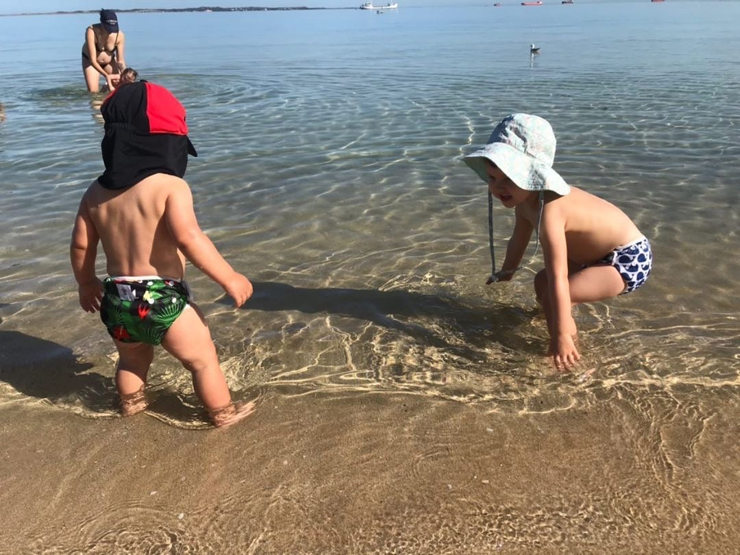 Reusable swim nappies packed for swimming lessons and holidays