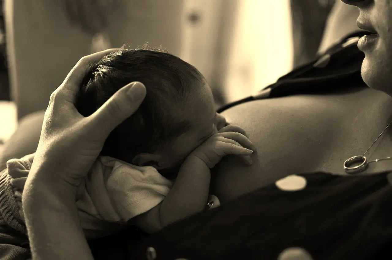 mum breastfeeding the baby